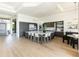 Spacious kitchen with a large island, modern appliances, and wood floors at 10795 E Sutherland Way, Scottsdale, AZ 85262