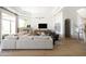Bright living room features a modern couch, stylish furniture, and recessed lighting at 10795 E Sutherland Way, Scottsdale, AZ 85262