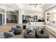 Bright and airy living room with comfortable seating and elegant decor with an open floor plan concept at 10795 E Sutherland Way, Scottsdale, AZ 85262