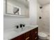 Bathroom features a vanity with storage, a sink, a backlit mirror, and a shower at 1308 N 71St St, Scottsdale, AZ 85257
