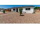 Inviting single-level home featuring low maintenance desert landscaping with a private carport at 1308 N 71St St, Scottsdale, AZ 85257