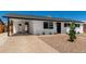This home boasts a covered parking, modern paint scheme and low-maintenance desert landscaping at 1308 N 71St St, Scottsdale, AZ 85257