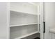 Walk-in pantry with shelving for optimal kitchen storage at 1308 N 71St St, Scottsdale, AZ 85257
