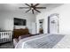 Spacious main bedroom with modern furnishings, including a comfortable sofa and decorative accents at 13628 W San Miguel Ave, Litchfield Park, AZ 85340