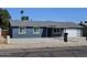 Charming single-story home boasts a modern design, complemented by a well-maintained yard at 13629 N 36Th St, Phoenix, AZ 85032