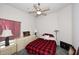 Bedroom with ceiling fan, carpet, and a plaid comforter at 16705 E Almont Dr # A, Fountain Hills, AZ 85268