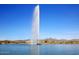 View of fountain in a scenic community lake with desert landscaping and mountainous horizon at 16705 E Almont Dr # A, Fountain Hills, AZ 85268