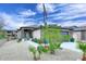 Beautiful single-story home with desert landscaping, stone accents, and a charming walkway at 16705 E Almont Dr # A, Fountain Hills, AZ 85268