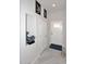 Inviting home hallway with tile floors, neutral paint, and modern decor at 16705 E Almont Dr # A, Fountain Hills, AZ 85268