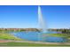 Scenic view of Fountain Hills lake with a large fountain in the center and waterfront homes at 16705 E Almont Dr # A, Fountain Hills, AZ 85268