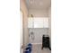 Small laundry room with white cabinets and washer hookups at 16705 E Almont Dr # A, Fountain Hills, AZ 85268