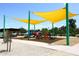 Inviting community playground with sunshades, surrounded by landscaped areas for outdoor recreation at 16705 E Almont Dr # A, Fountain Hills, AZ 85268