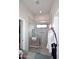 Modern tiled shower featuring glass door, shower head, and a window at 16705 E Almont Dr # A, Fountain Hills, AZ 85268
