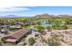 Aerial view of the golf course and lake by the clubhouse at 21166 W Main St, Buckeye, AZ 85396