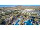 Luxury community with a resort-style pool, lush landscaping, and mountain views in a desirable neighborhood at 21166 W Main St, Buckeye, AZ 85396