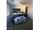 Bedroom with a view into the bathroom at 21166 W Main St, Buckeye, AZ 85396