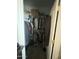 Walk-in closet with built-in shelves and ample storage space for clothes and accessories at 21166 W Main St, Buckeye, AZ 85396