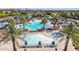 A community pool area features a sparkling pool, plenty of seating, and lush landscaping for a resort-like atmosphere at 21166 W Main St, Buckeye, AZ 85396