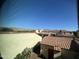 View of backyard and surrounding community at 21166 W Main St, Buckeye, AZ 85396