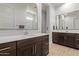 Elegant bathroom featuring double vanities, modern fixtures, and tile flooring at 24327 N 163Rd Dr, Surprise, AZ 85387