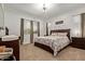Inviting bedroom featuring a comfortable bed, ample natural light, and neutral decor at 24327 N 163Rd Dr, Surprise, AZ 85387