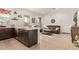 Bright living space integrating the kitchen and Gathering room in an open layout perfect for entertaining at 24327 N 163Rd Dr, Surprise, AZ 85387