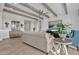 Living area features beamed ceilings, comfortable furnishings, and built-in cabinetry at 2546 E Russell St, Mesa, AZ 85213
