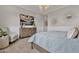 Bright primary bedroom featuring a dresser, artwork, and elegant decorative accents at 2546 E Russell St, Mesa, AZ 85213