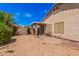 Backyard with patio and desert landscaping at 2635 E Riviera Dr, Chandler, AZ 85249