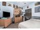 Bedroom featuring a ceiling fan, carpet floors, and a dresser for storage at 2635 E Riviera Dr, Chandler, AZ 85249