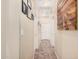 Hallway showcasing carpet floors, neutral walls, and modern decor at 2635 E Riviera Dr, Chandler, AZ 85249