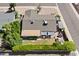 Aerial view of property featuring an expansive backyard with patio, mature trees, and meticulous landscaping at 2902 E Corrine Dr, Phoenix, AZ 85032