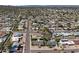 Residential aerial view showcases a mature tree, backyard, and desert landscaping of this centrally located home at 2902 E Corrine Dr, Phoenix, AZ 85032