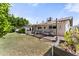 Spacious backyard with patio featuring multiple seating areas and vibrant greenery perfect for outdoor enjoyment at 2902 E Corrine Dr, Phoenix, AZ 85032