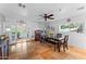Open dining area with a table, chairs and view of the outdoor patio at 2902 E Corrine Dr, Phoenix, AZ 85032
