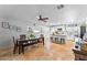 Spacious dining area with table, chairs, and access to the kitchen at 2902 E Corrine Dr, Phoenix, AZ 85032
