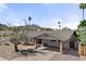 Lovely home featuring desert landscaping, brick accents, covered carport, and mountain views at 2902 E Corrine Dr, Phoenix, AZ 85032