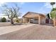 Inviting single-story home featuring a wide covered carport and desert landscaping at 2902 E Corrine Dr, Phoenix, AZ 85032
