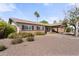 Charming single-story home featuring a well-kept front yard and convenient carport at 2902 E Corrine Dr, Phoenix, AZ 85032