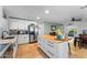 Bright kitchen featuring white cabinets, stainless appliances, and a butcher block island at 2902 E Corrine Dr, Phoenix, AZ 85032