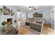 Cozy living room with a white fireplace, comfortable seating, and a decorative rug at 2902 E Corrine Dr, Phoenix, AZ 85032