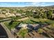 Aerial view of a neighborhood park with playground, walking paths, trees, and residential area at 3003 E Ironside Ln, Gilbert, AZ 85298
