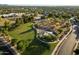 Aerial view of a neighborhood park, lush landscaping, walking paths, and community at 3003 E Ironside Ln, Gilbert, AZ 85298