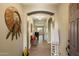 Welcoming foyer with tile flooring, an archway, and decorative accents that enhance the home's character at 3003 E Ironside Ln, Gilbert, AZ 85298