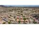 Picturesque aerial view of a suburban neighborhood with homes, desert landscape, and distant mountains at 3166 E Desert Willow Rd, Phoenix, AZ 85048