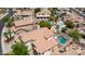 An aerial shot of a gorgeous residence with an outdoor swimming pool and stunning lush landscaping at 3166 E Desert Willow Rd, Phoenix, AZ 85048