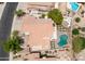 Aerial view of the roof, pool, patio, and landscaping for this property at 3166 E Desert Willow Rd, Phoenix, AZ 85048