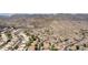 Stunning aerial view of a charming neighborhood nestled against a picturesque mountain backdrop at 3166 E Desert Willow Rd, Phoenix, AZ 85048