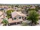 Gorgeous home with a beautiful roof, attached garage, lovely trees, and appealing landscaping at 3166 E Desert Willow Rd, Phoenix, AZ 85048