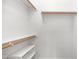Clean and functional closet space with shelves and hanging rods for organized storage at 3166 E Desert Willow Rd, Phoenix, AZ 85048